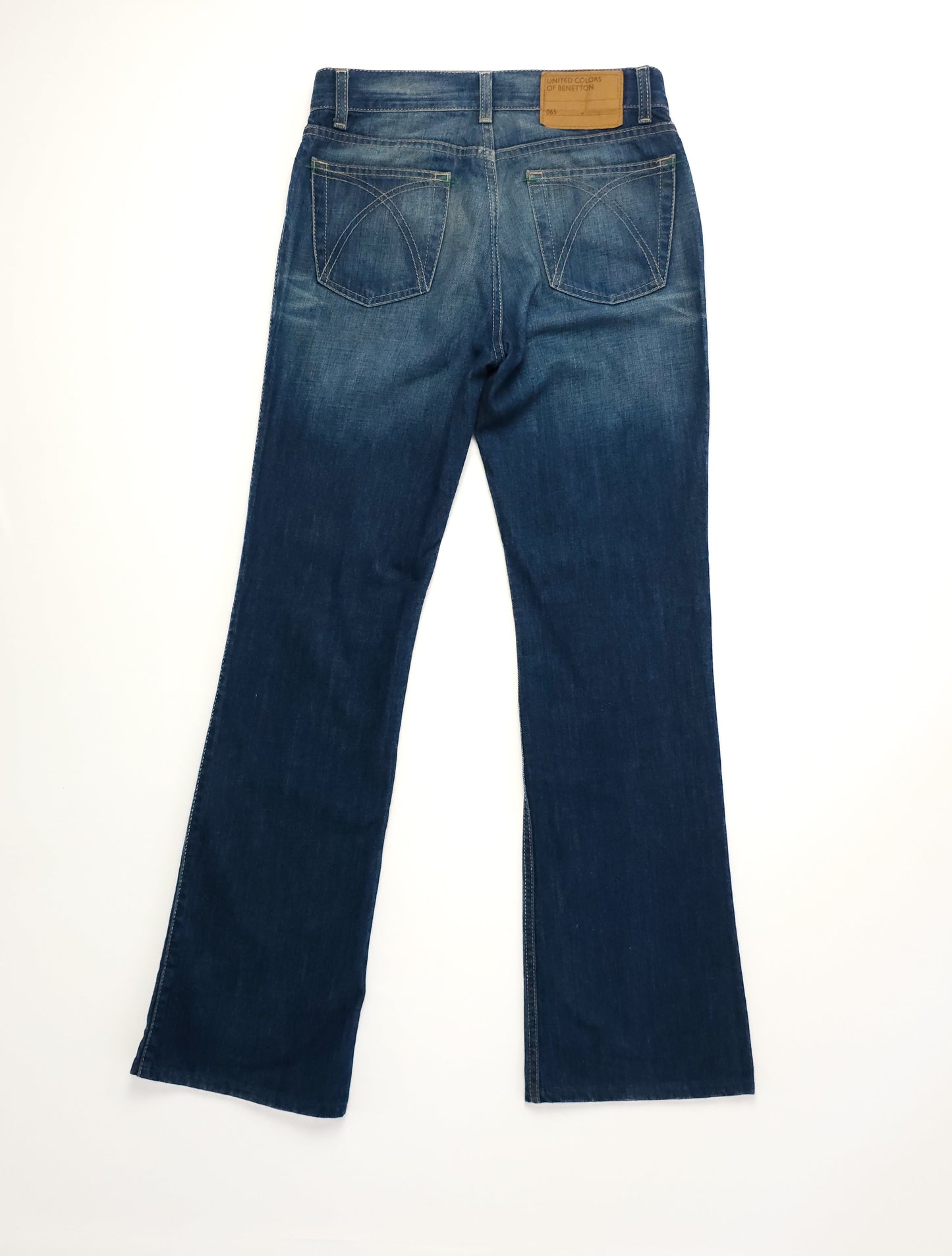 Blue denim jeans with a bootcut style, featuring two back pockets with distinct stitching, displayed on a white background.
