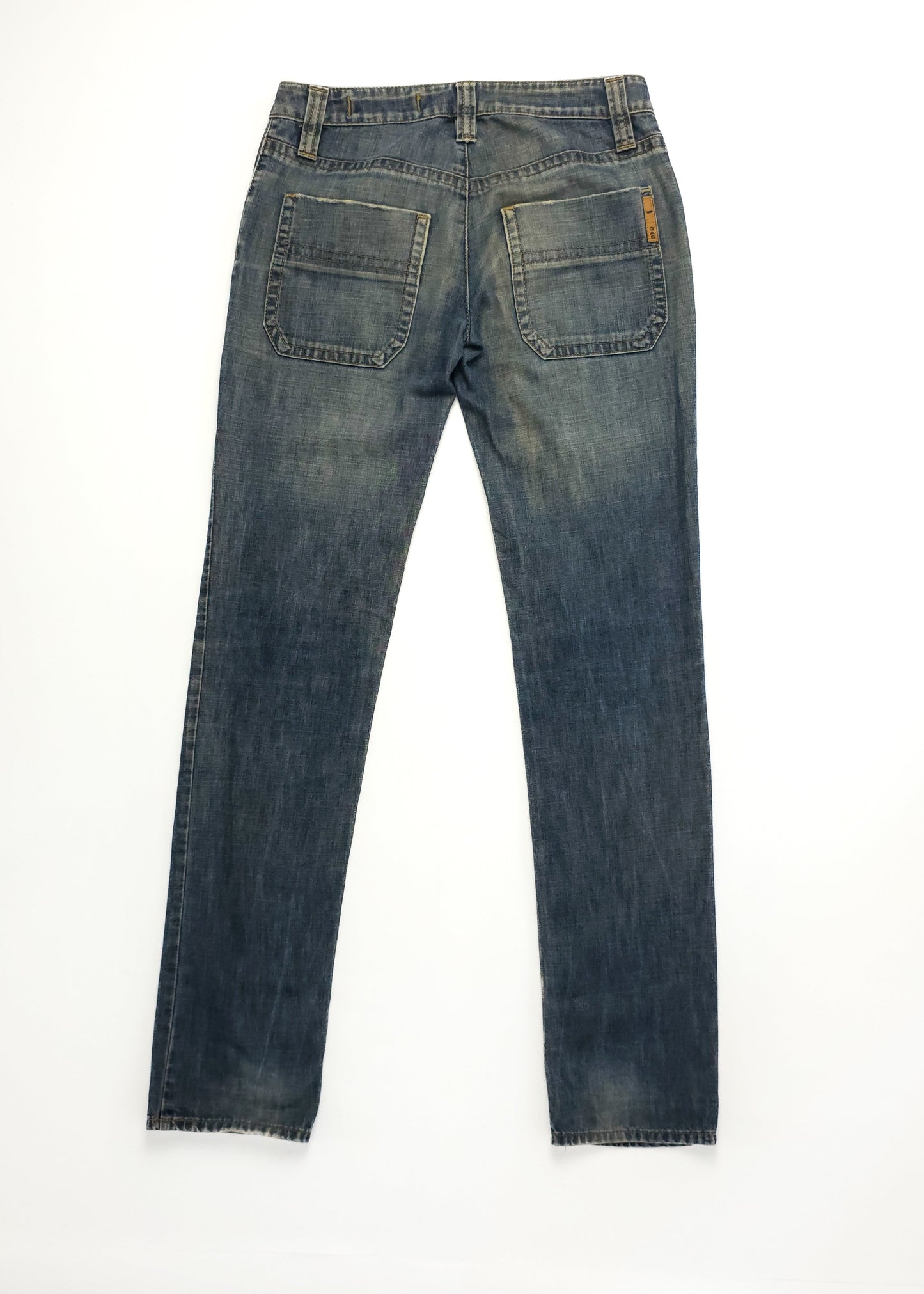 Rear view of vintage blue Gas jeans with back pockets.