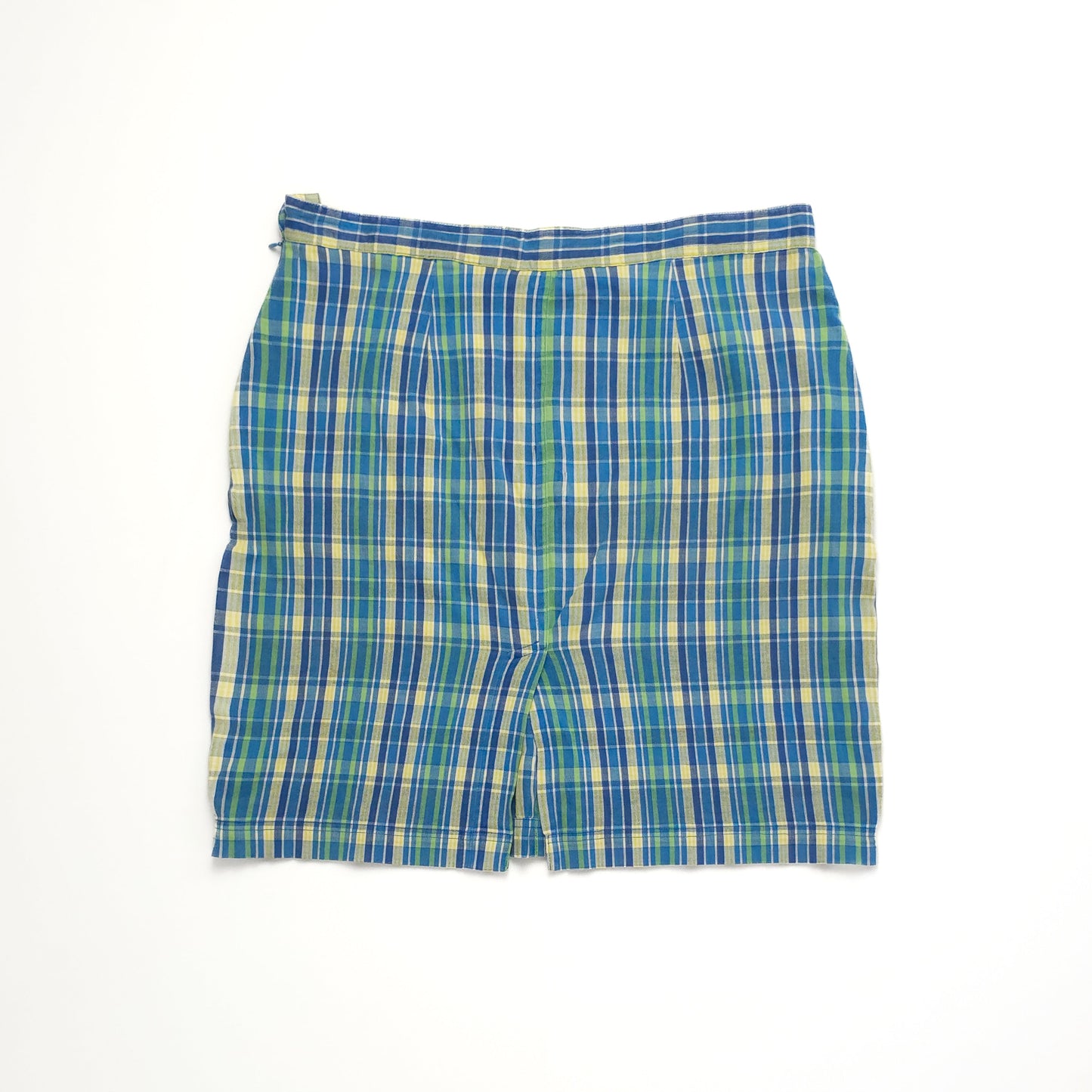 A vintage blue and green plaid skirt with a high waist and pleats, displayed flat on a white background.