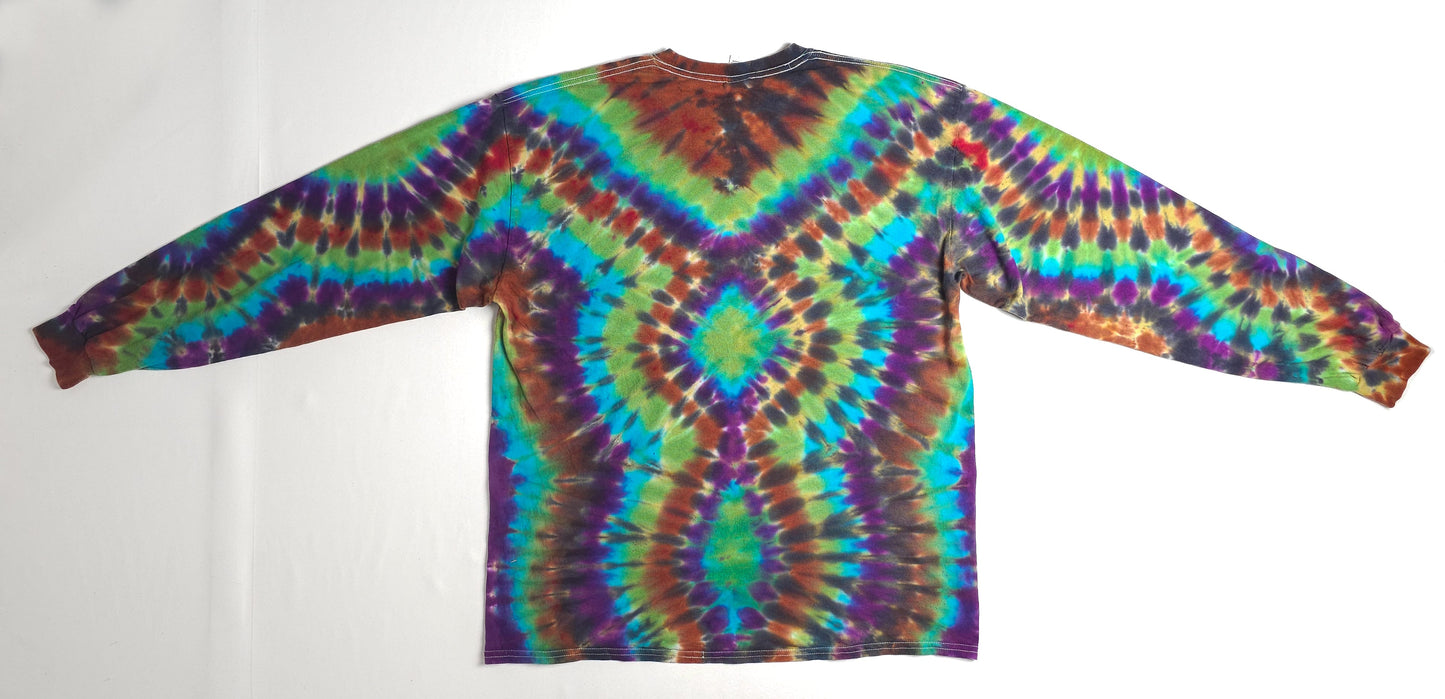 Long-sleeved tie-dye shirt in vibrant colors with a symmetrical pattern, featuring shades of blue, green, purple, red, and orange.