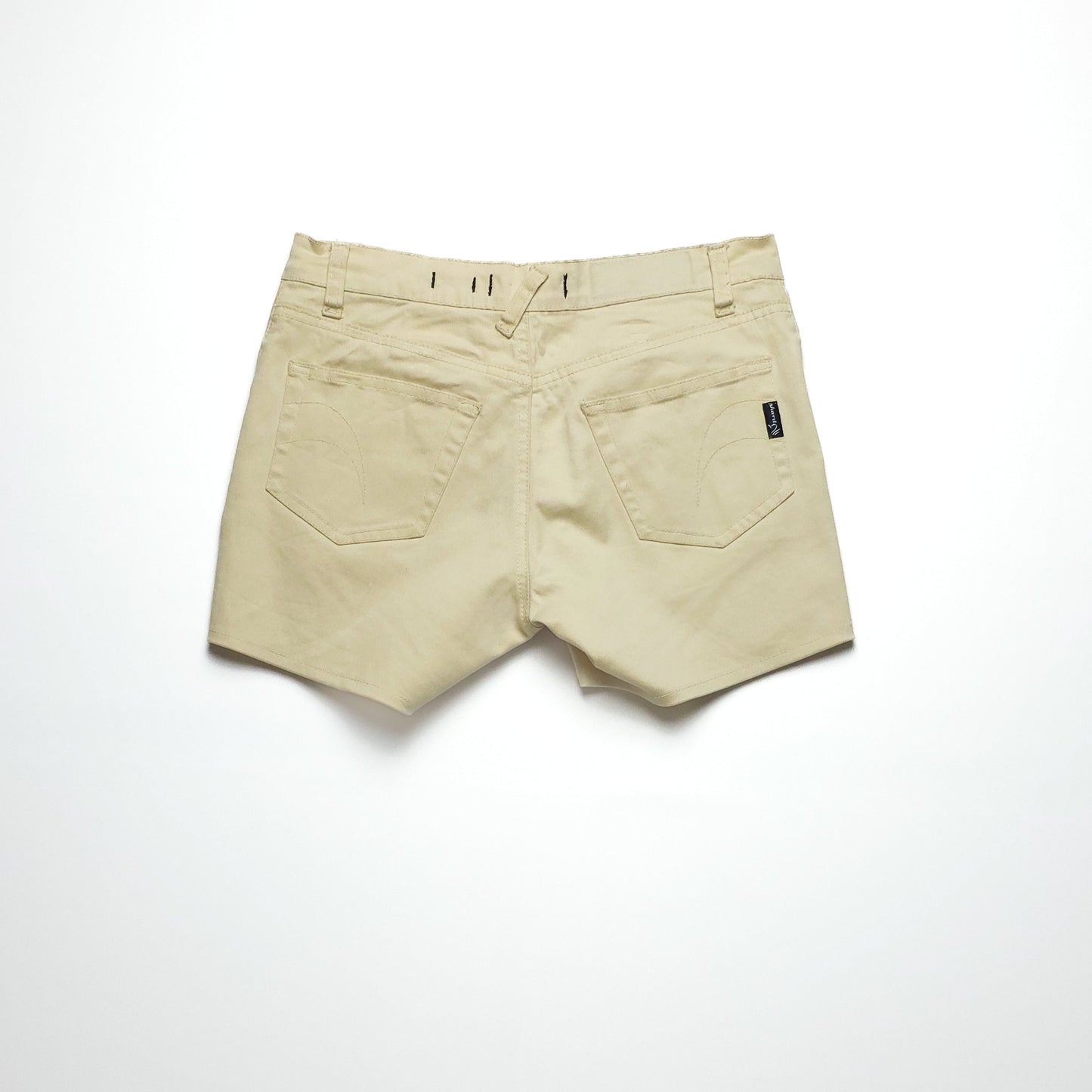 Beige denim shorts facing backward with two back pockets and belt loops, placed against a white background.