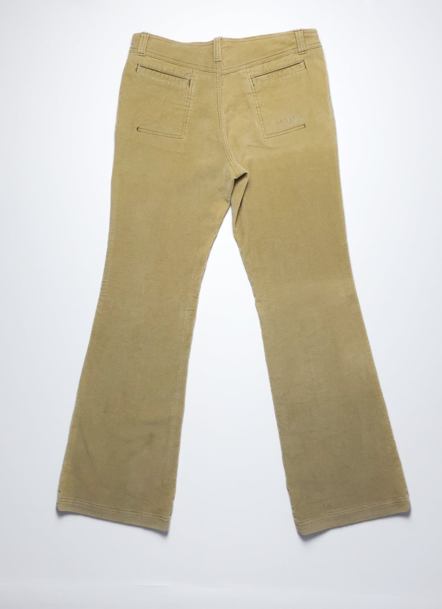 Beige corduroy flared pants with back pockets, laid flat to display the back view against a plain white background.