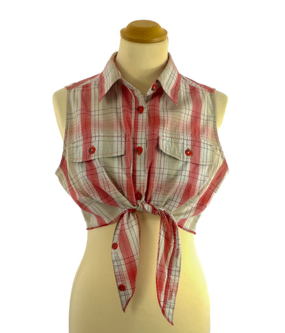 A sleeveless plaid top with a tie-front design and button-down closure.