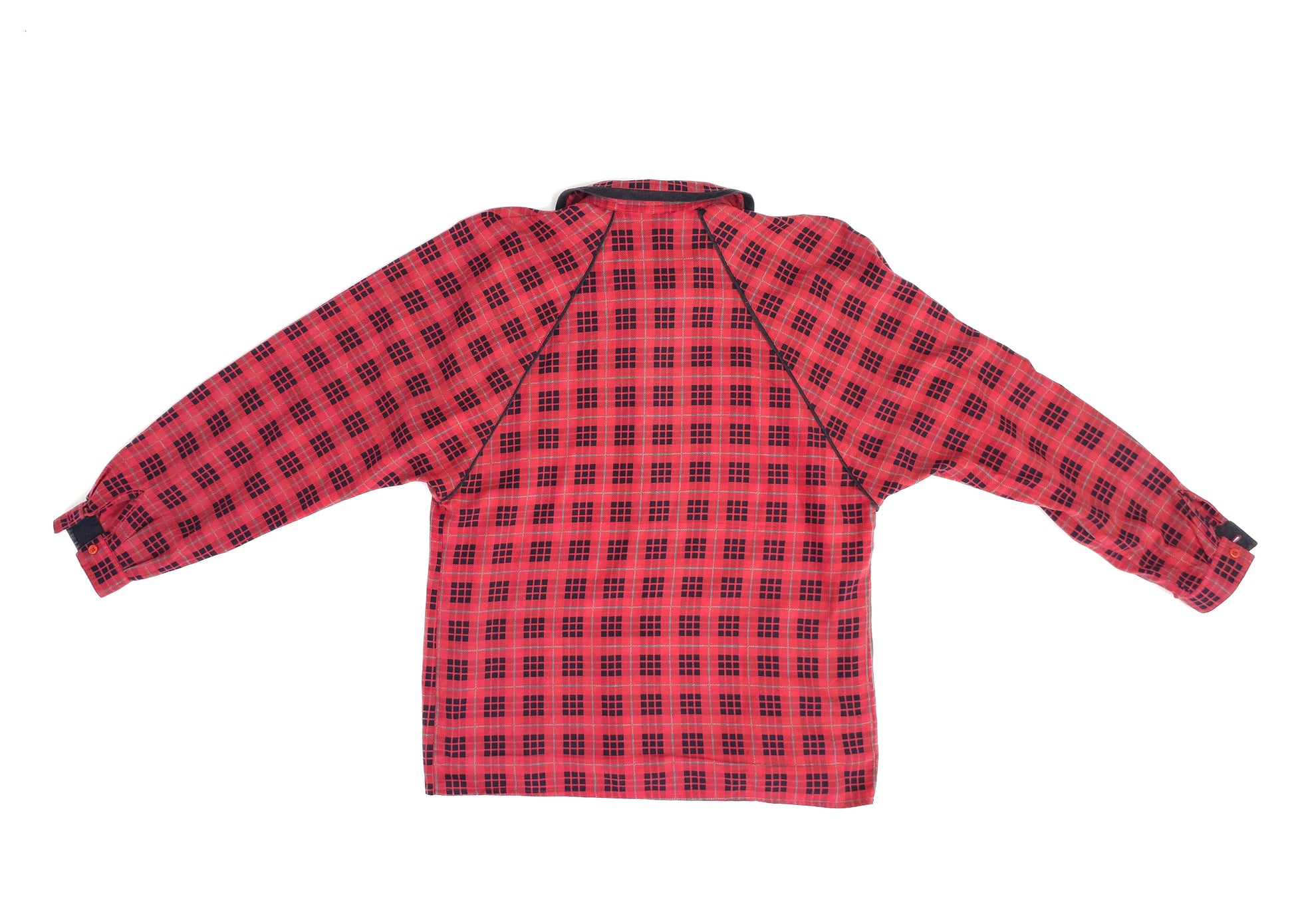 Red checkered long-sleeve shirt with a relaxed fit and button details.