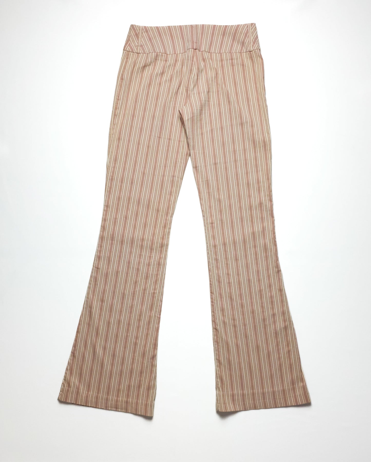 Beige and red striped flared pants with a high waistband, laid flat on a white surface. The pants feature a subtle pattern and a stylish, retro flair.